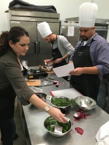 Teams creating Salmon Mousse appetizer at Shamir Lense cooking class team building event. 