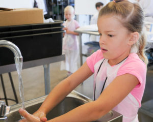 Kids should wash their hands and count to twenty before rinsing.